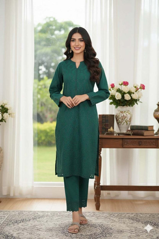 Dark green 03-piece lawn embroidered suit with shirt and trouser modeled indoors